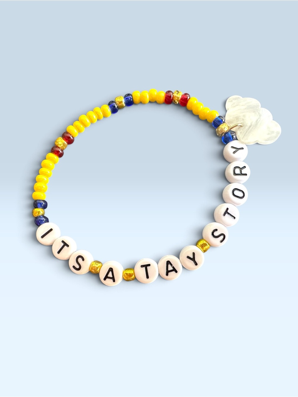 Handmade It’s a Tay Story /Toy Story beaded bracelet with cloud charm